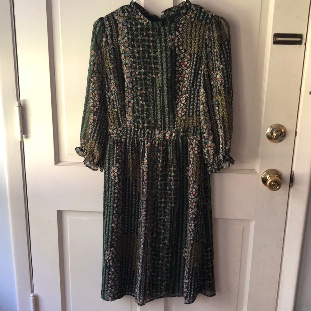 Long sleeve boho look dress .